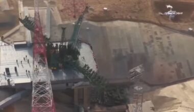 drone video still of a launch pad after a launch showing damage to the infrastructure at the base of the flame trench