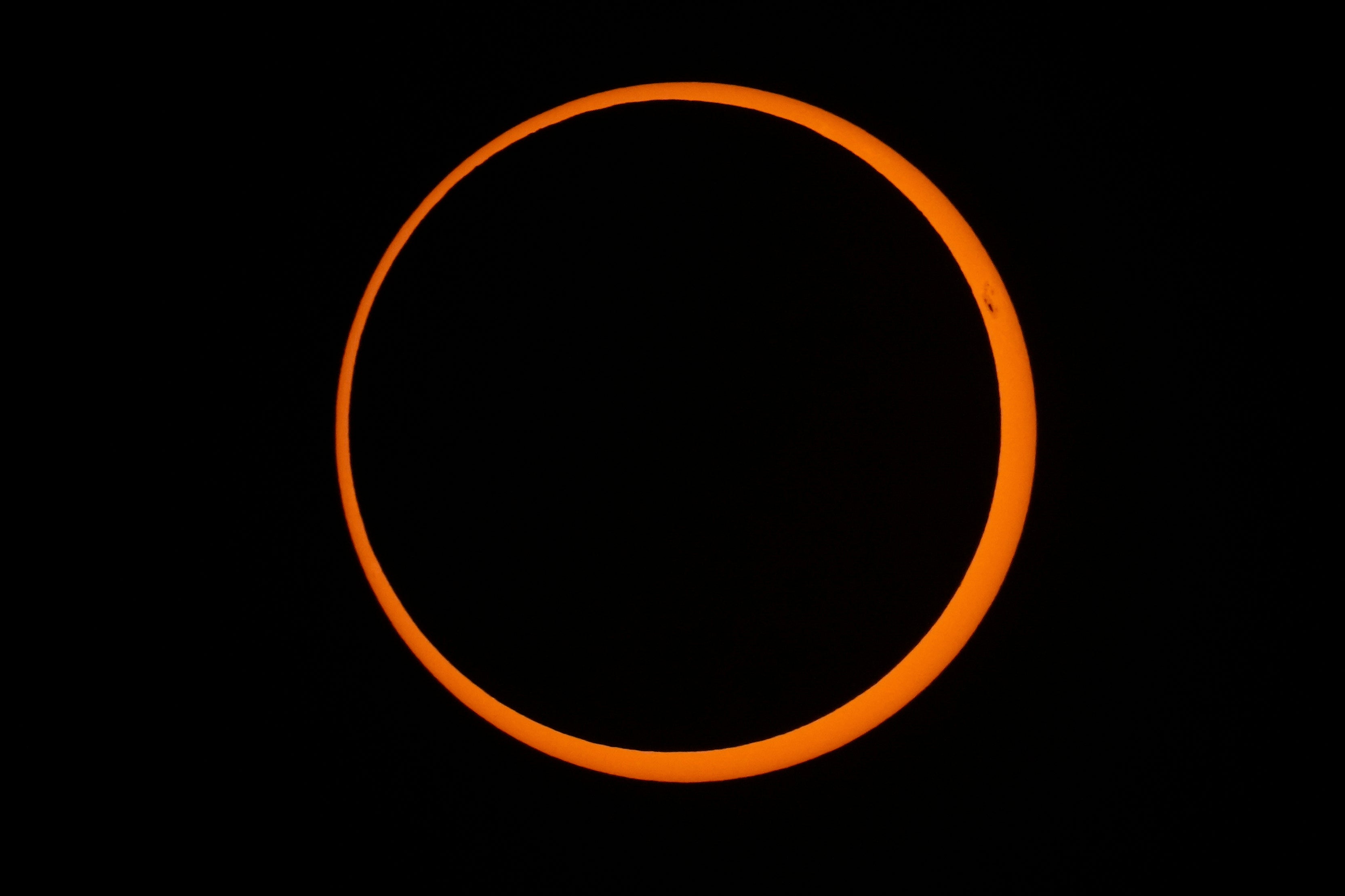 The moon moves across the sun during a 