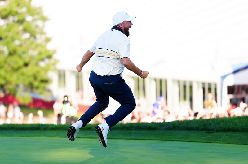 Shane Lowry celebrates a putt on the 18th green to retain the Ryder Cup for Team Europe. Photograph: David Davies/PA