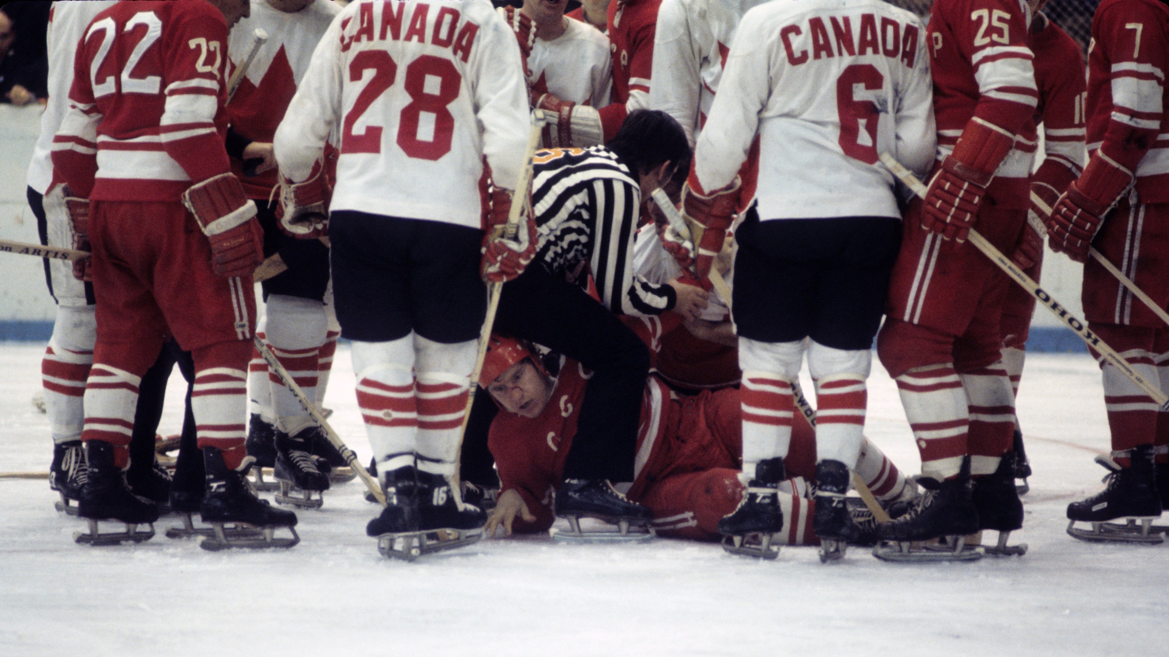 Hockey: The Summit Series: Referee tending to Soviet Union player after sustaining injury during Game 5 vs Canada at Luzhniki Ice Palace. Moscow, Soviet Union 9/22/1972 CREDIT: Melchior DiGiacomo (Photo by Melchior DiGiacomo /Sports Illustrated via Getty Images) (Set Number: X17129 TK3 )