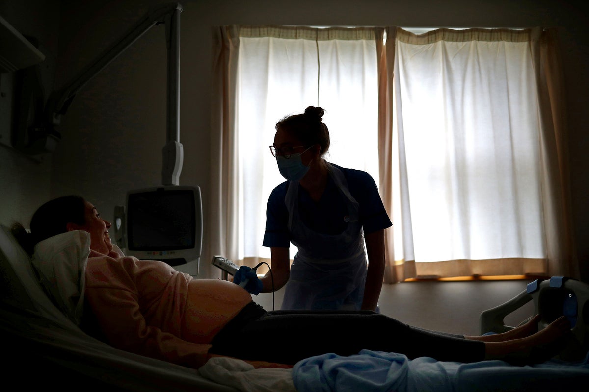 Midwives call for limits on ‘dangerously long’ working hours putting mothers and babies at risk