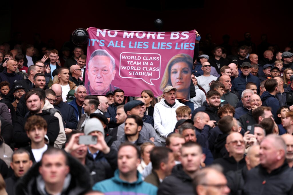 West Ham fans protest with a banner targeting David Sullivan and Karren Brady