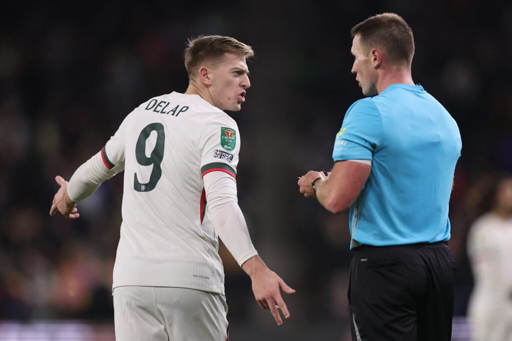 Chelsea striker Liam Delap protests sending off