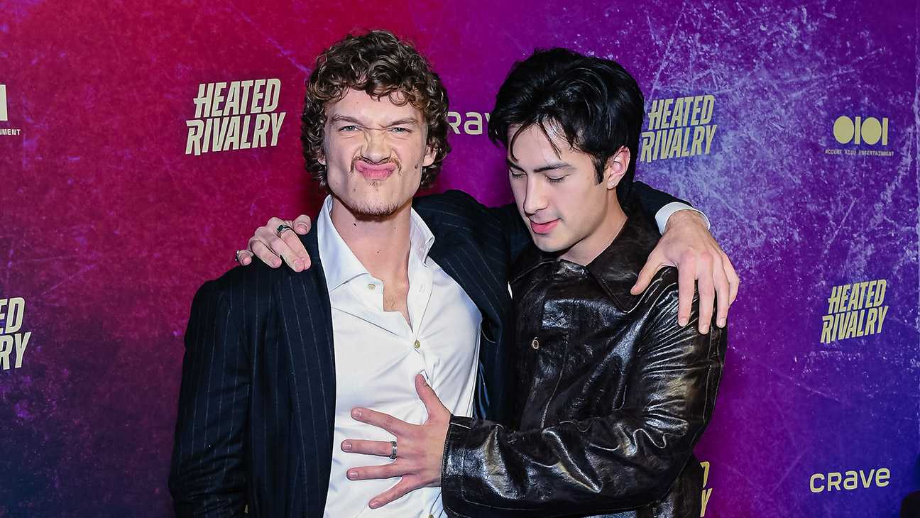Connor Storrie and Hudson Williams attend the premiere of Heated Rivalry at TIFF Lightbox on November 24, 2025 in Toronto, Ontario.