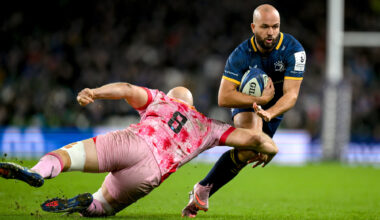 Tom Lawday of Harlequins tackles Jamison Gibson-Park of Leinster during the December 2025 European Champions Cup match