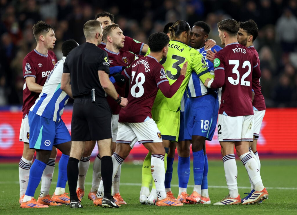 Alphonse Areola confronts Danny Welbeck during West Ham United v Brighton & Hove Albion - Premier League