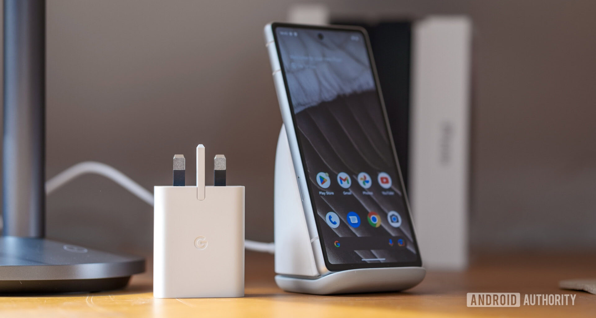 Google Pixel 7a charging plug and wireless dock
