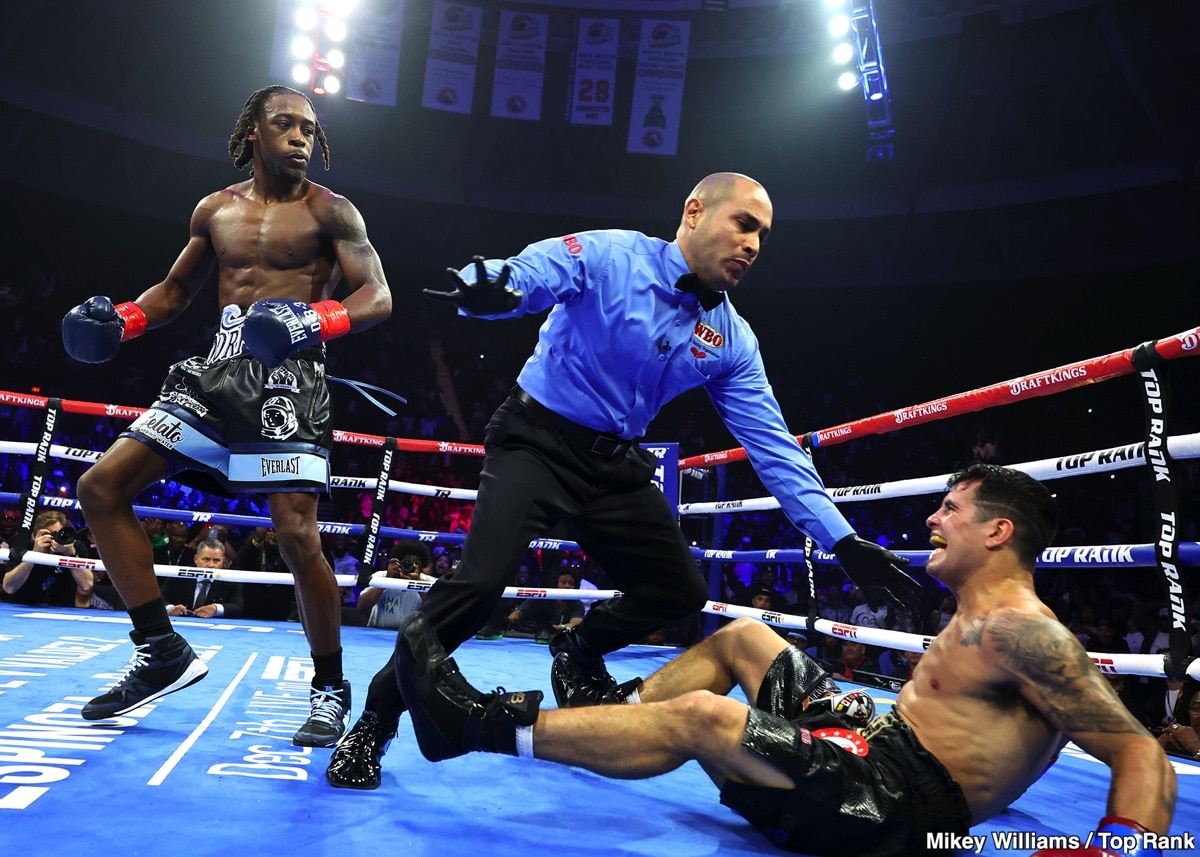 Keyshawn Davis drops Gustavo Lemos as the referee steps in during the second round of their lightweight fight at the Scope Arena in Norfolk, Virginia.