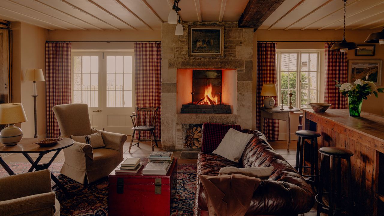 A farmhouse owned by Guy Ritchie imbued with a colonial-American-meets-English-pub aesthetic