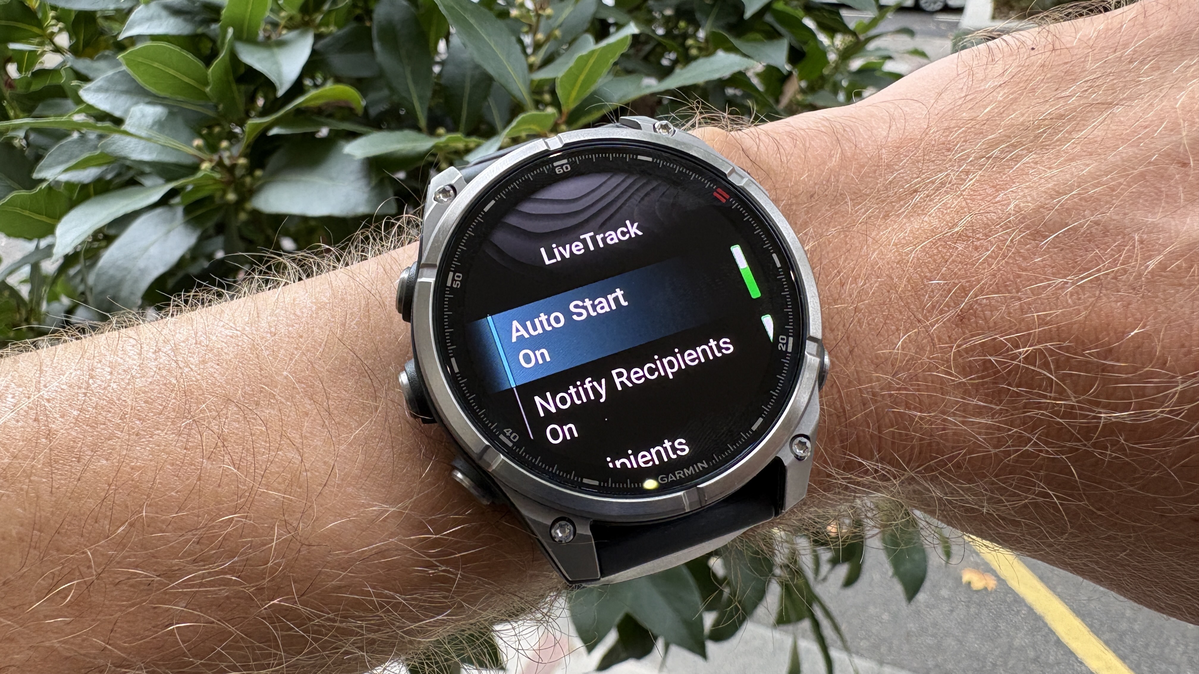 Garmin Fenix 8 Pro on wrist showing LiveTrack feature
