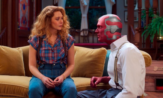 This image released by Disney+ shows Elizabeth Olsen, left and Paul Bettany in a scene from 