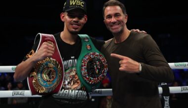 Diego Pacheco poses with promoter Eddie Hearn inside the ring after his unanimous decision win over Kevin Lele Sadjo in Stockton, California.