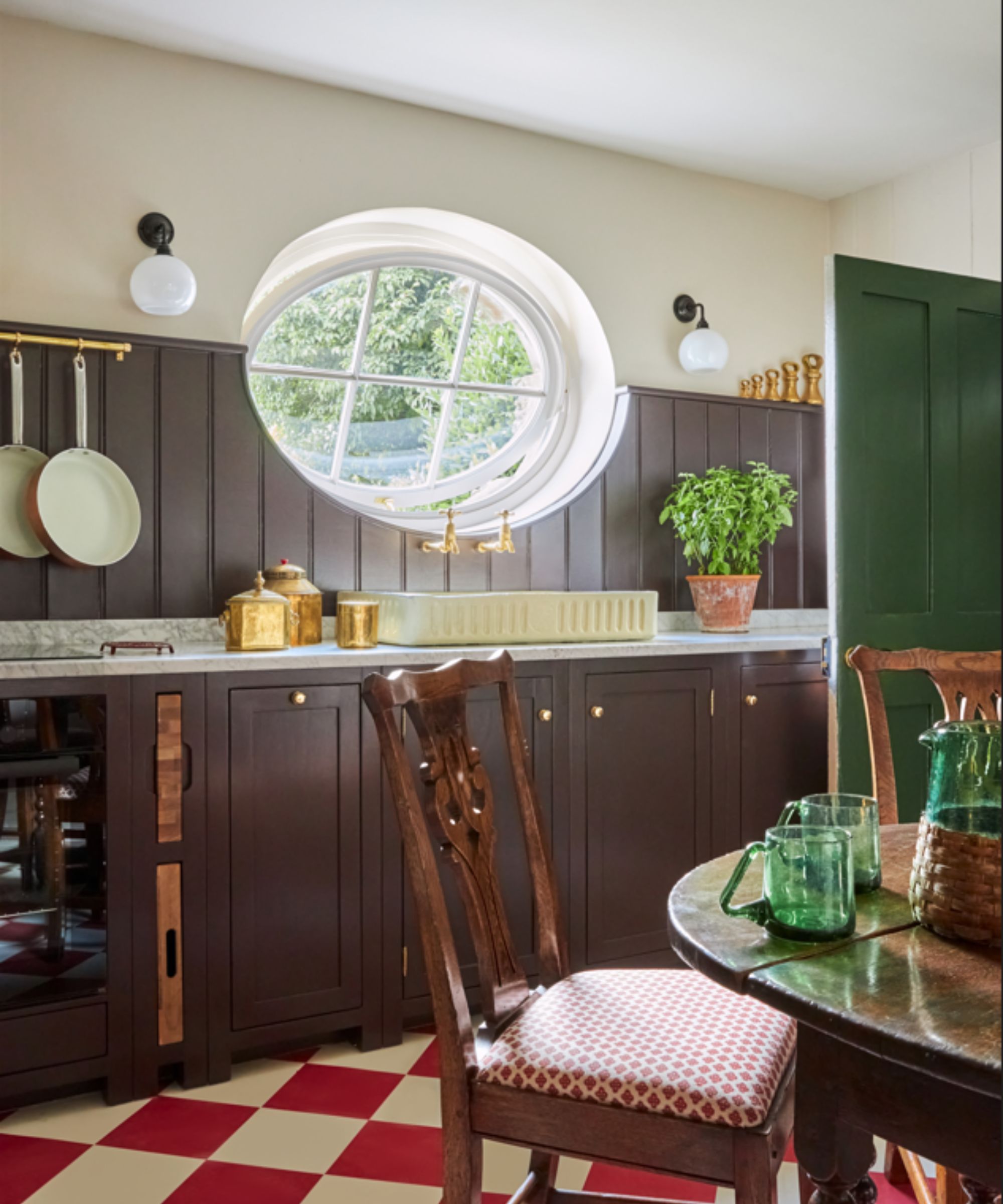 kitchen with brown cabinets and checked floor