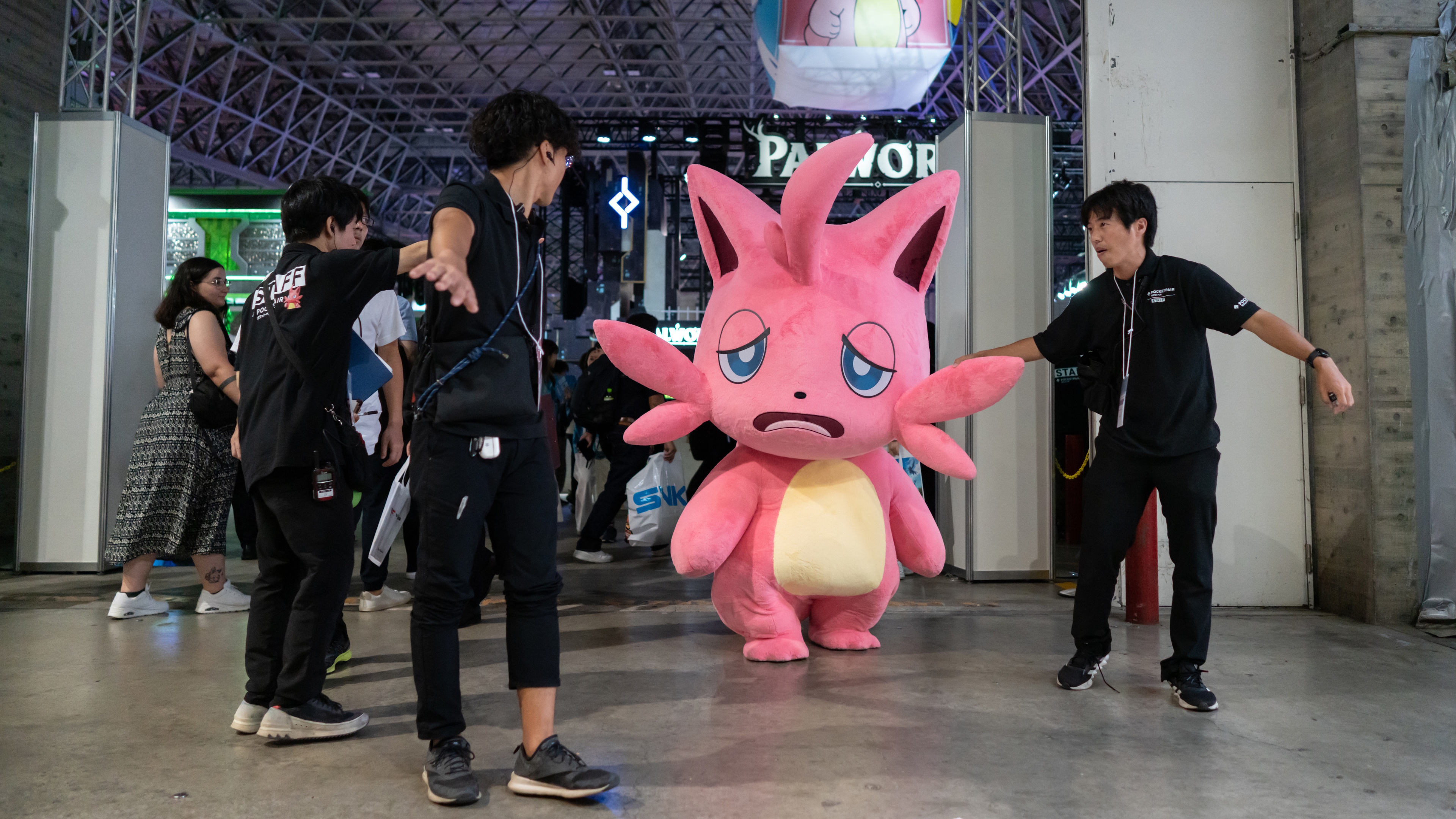 CHIBA, JAPAN - SEPTEMBER 26: A performer dressed as a Palworld game character is escorted during the Tokyo Game Show 2024 at Makuhari Messe on September 26, 2024 in Chiba, Japan. The gaming exhibition is one of the world's largest and will be held through September 29th. (Photo by Tomohiro Ohsumi/Getty Images)
