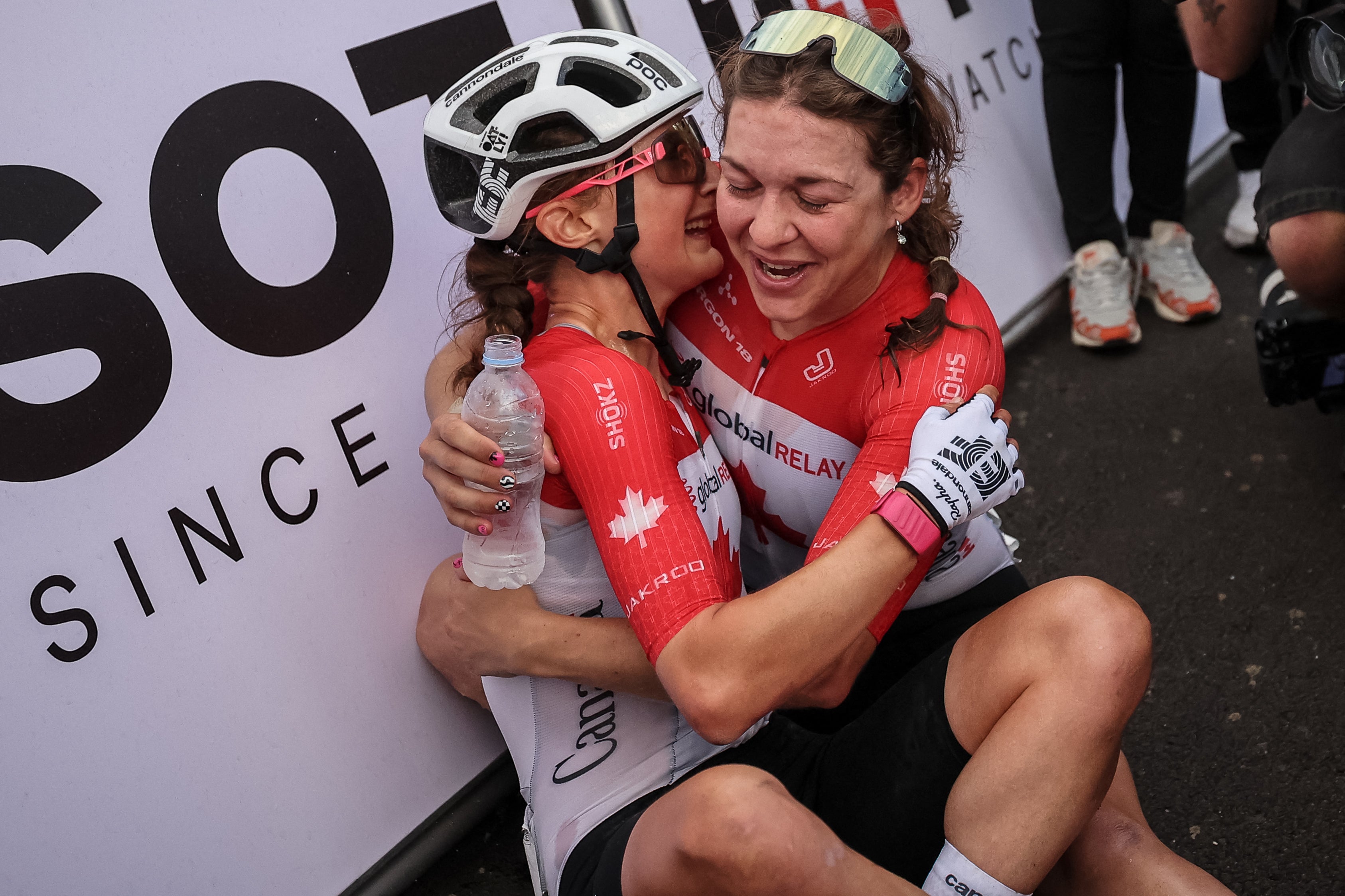 A stunned Magdeleine Vallieres was congratulated by overjoyed teammates in Rwanda