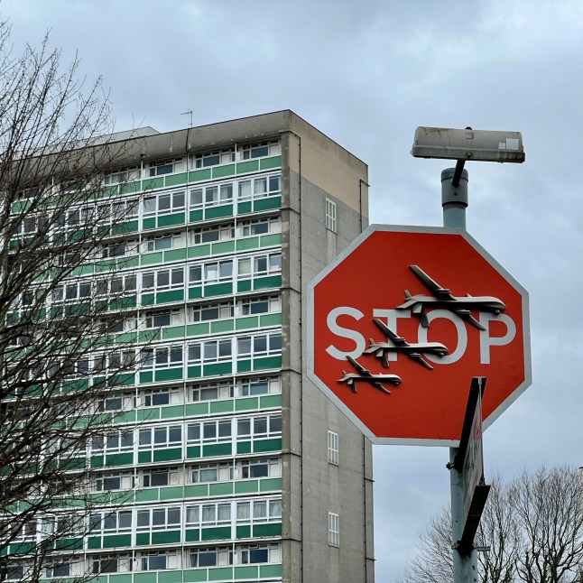 Banksy artwork depicting drones covers a stop sign in London, Britain December 22, 2023 in this picture obtained from social media. Joe Brown via REUTERS THIS IMAGE HAS BEEN SUPPLIED BY A THIRD PARTY. MANDATORY CREDIT. NO RESALES. NO ARCHIVES.