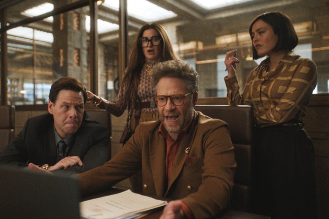 This image released by Apple TV+ shows Ike Barinholtz, from left, Kathryn Hahn, Chase Sui Wonders and Seth Rogen in a scene from 