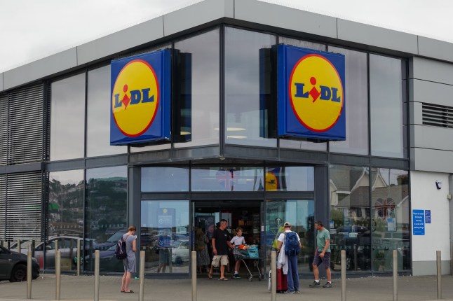 PENZANCE, UNITED KINGDOM - AUGUST 14: The Lidl logo is displayed outside a branch of the supermarket retailer Lidl on August 14, 2025 in Cornwall, England.The British retailer, founded in 1869, is one of the largest market leaders of groceries in the UK. (Photo by Matt Cardy/Getty Images)