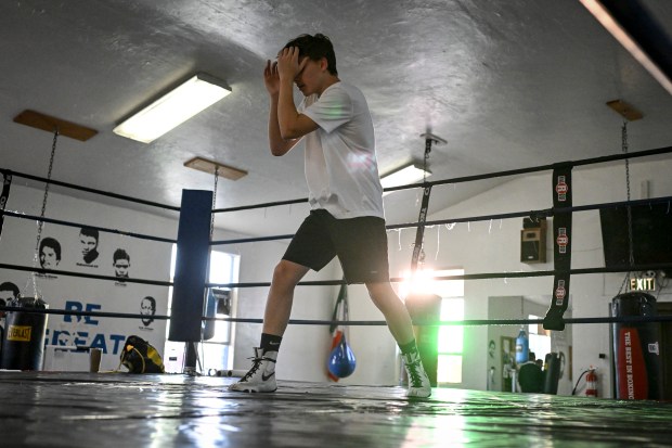 Corbin Canada shadow boxes at the Denver Police Brotherhood Youth Boxing club on Monday, Dec. 22, 2025. (Photo by AAron Ontiveroz/The Denver Post)