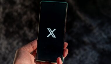 X logo on a phone screen