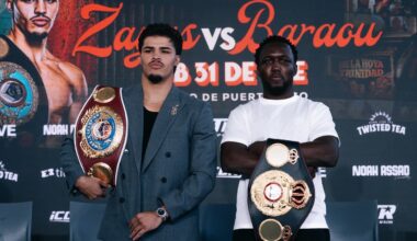 Xander Zayas and Abass Baraou pose with their championship belts at a press conference in San Juan, Puerto Rico, ahead of their January 31, 2025 junior middleweight title fight.