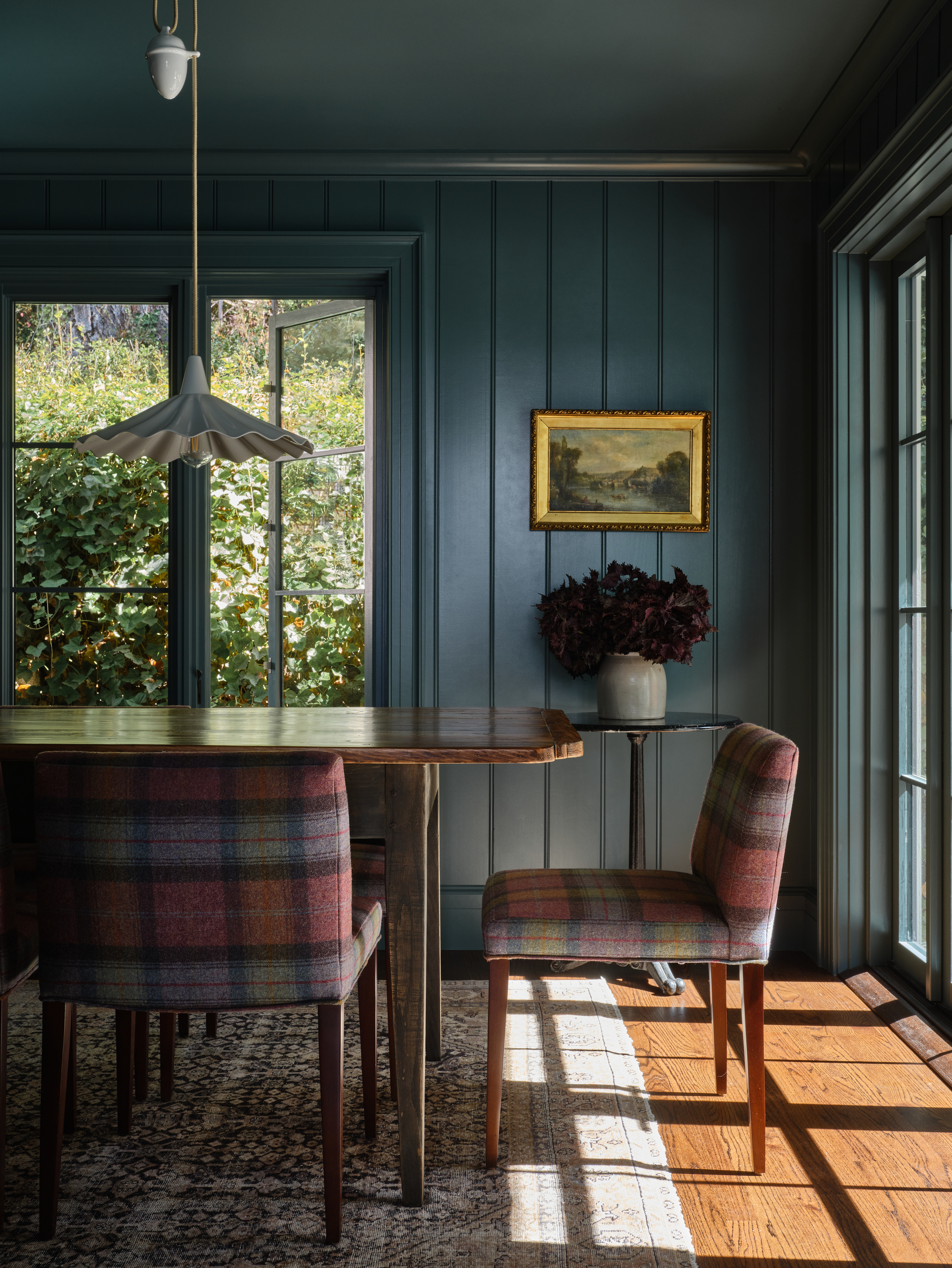 A navy blue dining room