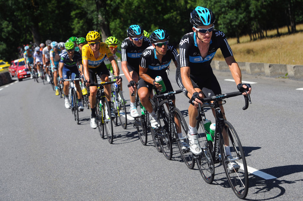 Team Sky lead the Tour de France peloton in 2012, Bradley Wiggins in yellow