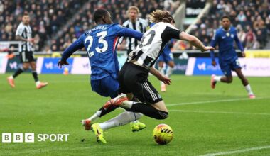 Newcastle forward Anthony Gordon is challenged inside the box by Chelsea defender Trevoh Chalobah