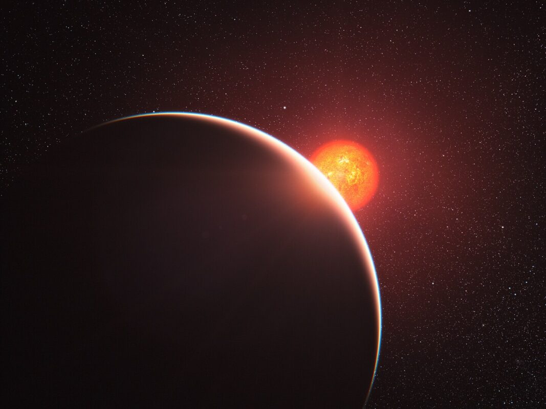 Artist's Impression Of Gj 1214 B (foreground), Illuminated By The Red Light Of Its Parent Star
