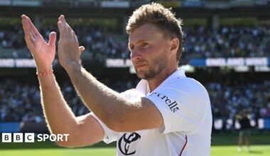 Joe Root claps supporters