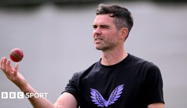 Former England bowler James Anderson tosses a ball in the air