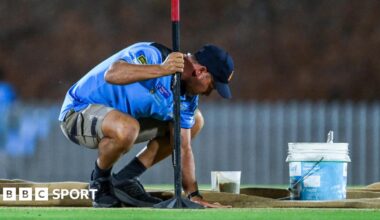 Groundstaff attend to pitch in Adelaide