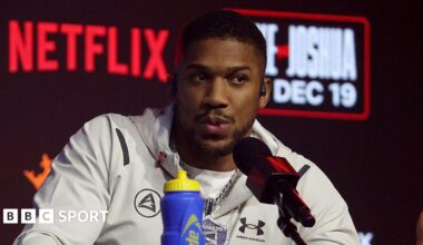Anthony Joshua speaks at a news conference