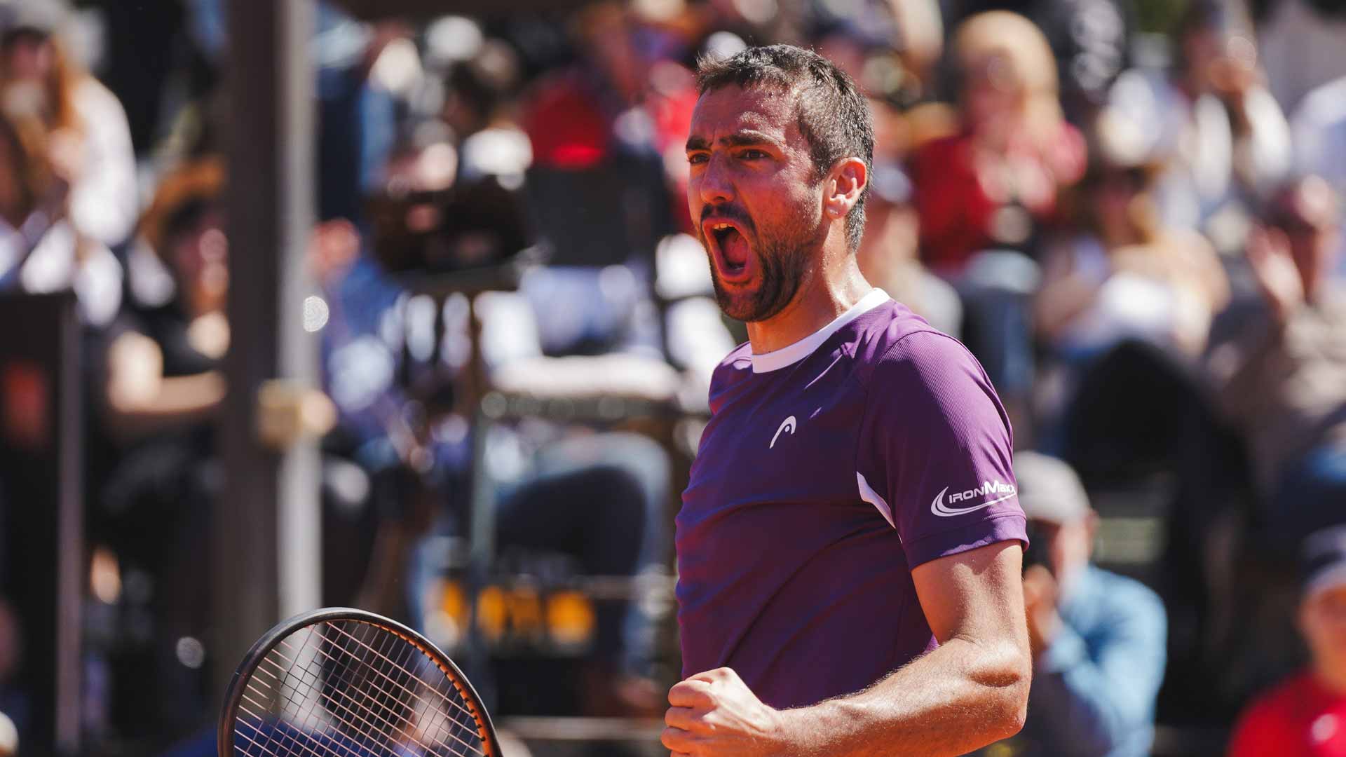 Marin Cilic celebrates winning the ATP Challenger 100 event in Girona, Spain.