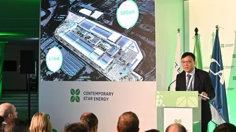 AFP via Getty Images Andy Wu, chief executive of the joint Dutch-Chinese firm building the new battery factory, speaks at a press conference in Figueruelas last month