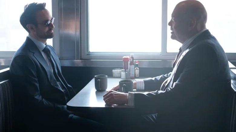 Charlie Cox's Matt Murdock and Vincent D'Onofrio's Wilson Fisk sitting in a diner on Daredevil: Born Again