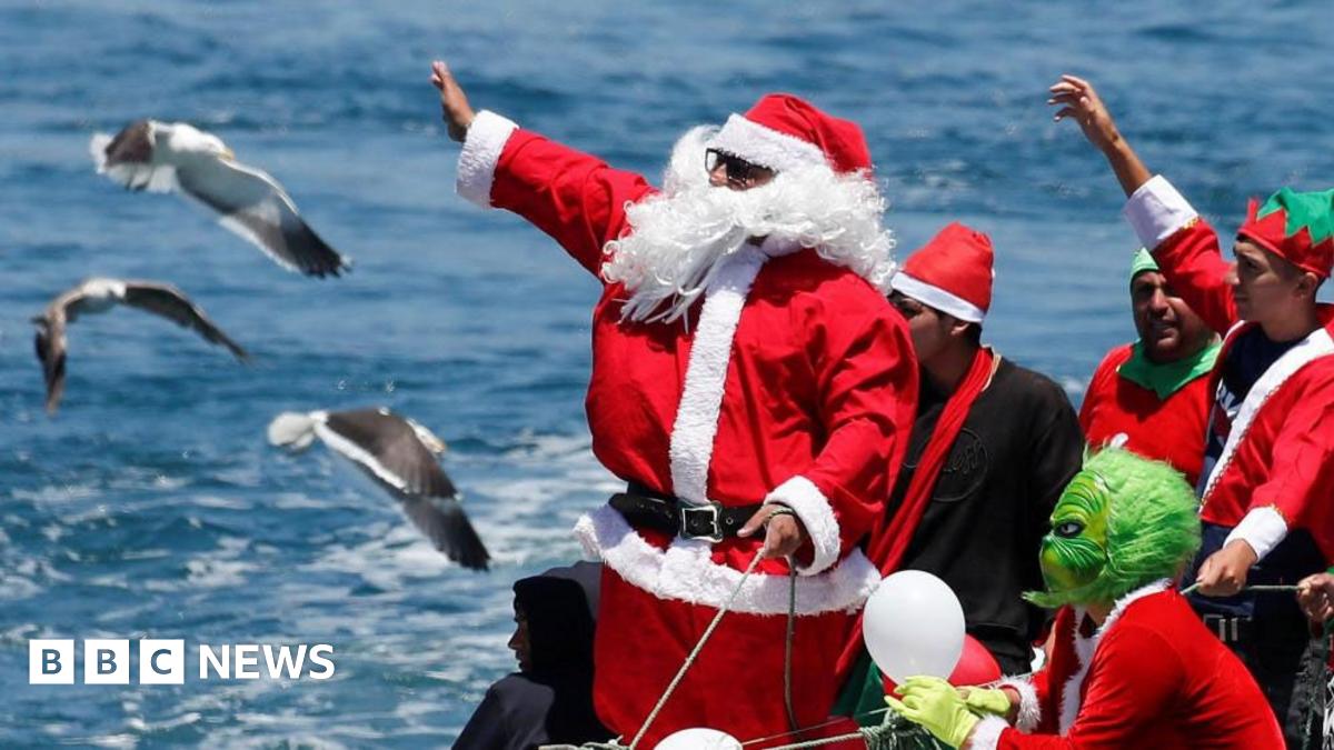 Workers sell off cuts of meat during the traditional Christmas Eve auction at Smithfield meat market in London, UK on 24 December 2025.