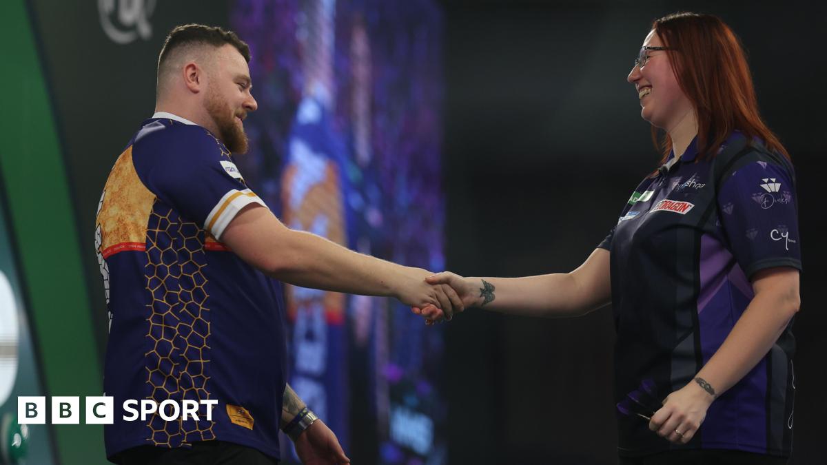 Josh Rock shakes hands with Gemma Hayter