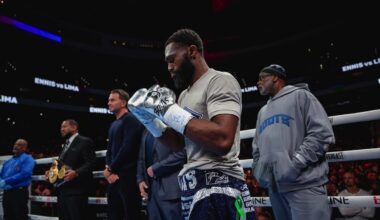 Jaron “Boots” Ennis stands inside the ring wearing gloves before his fight against Uisma Lima on October 11, 2025, at the Wells Fargo Center in Philadelphia.