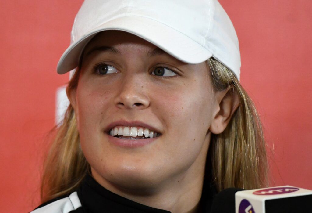 Eugenie Bouchard Stuns in a Golden Dress While Attending a Miami Party With Friends