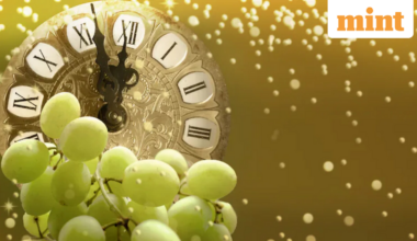 What is the 12 grapes tradition believed to bring happiness and success.