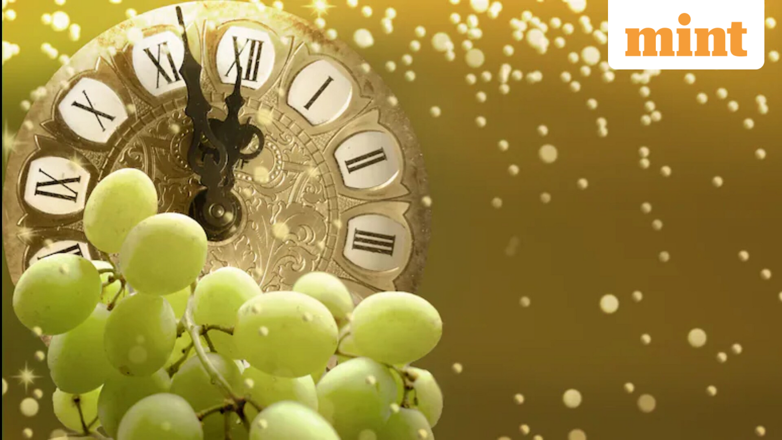 What is the 12 grapes tradition believed to bring happiness and success.