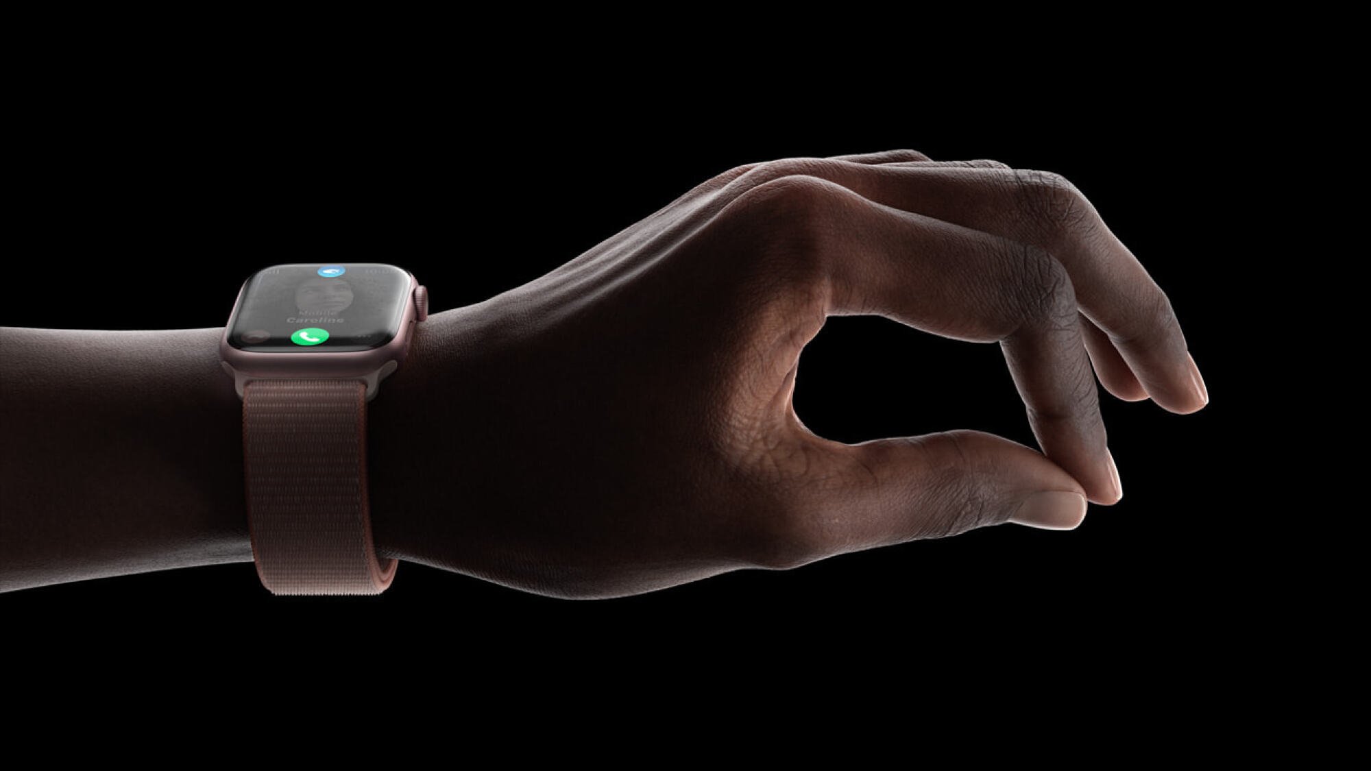 Apple Watch double-tap gesture.