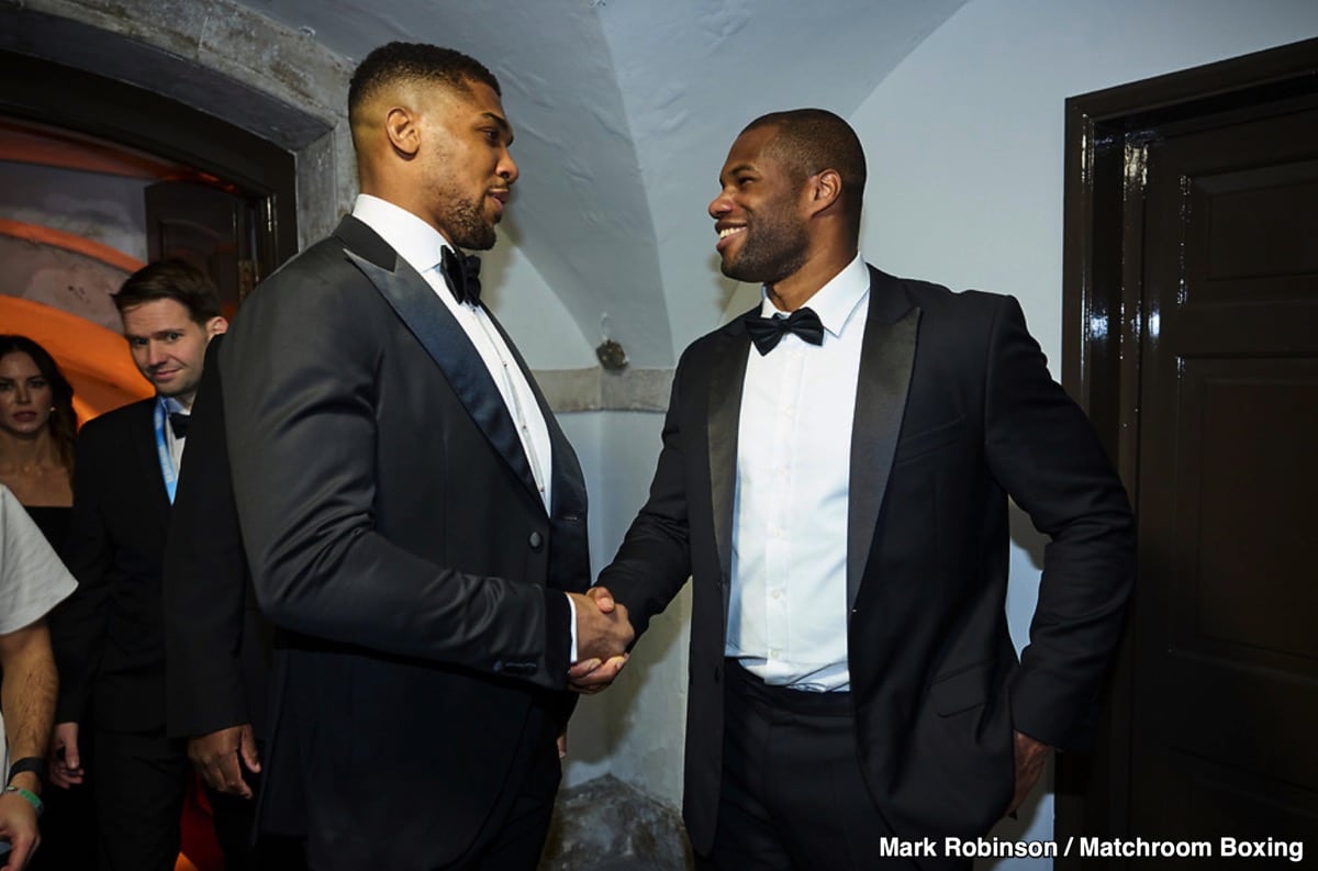 Anthony Joshua and Daniel Dubois meet during an event.