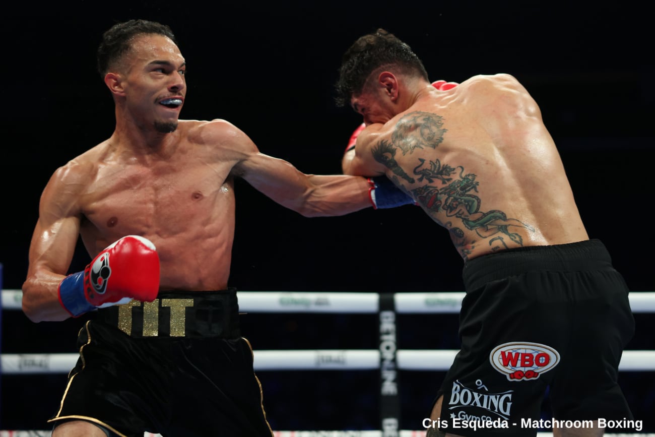 Ernesto Mercado lands a left hand on Antonio Moran during their WBO International light welterweight title fight
