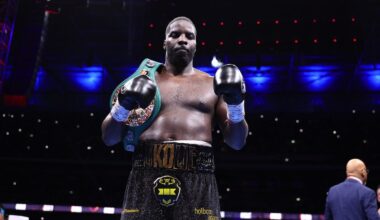 Lawrence Okolie stands in the ring after defeating Kevin Lerena by unanimous decision in London