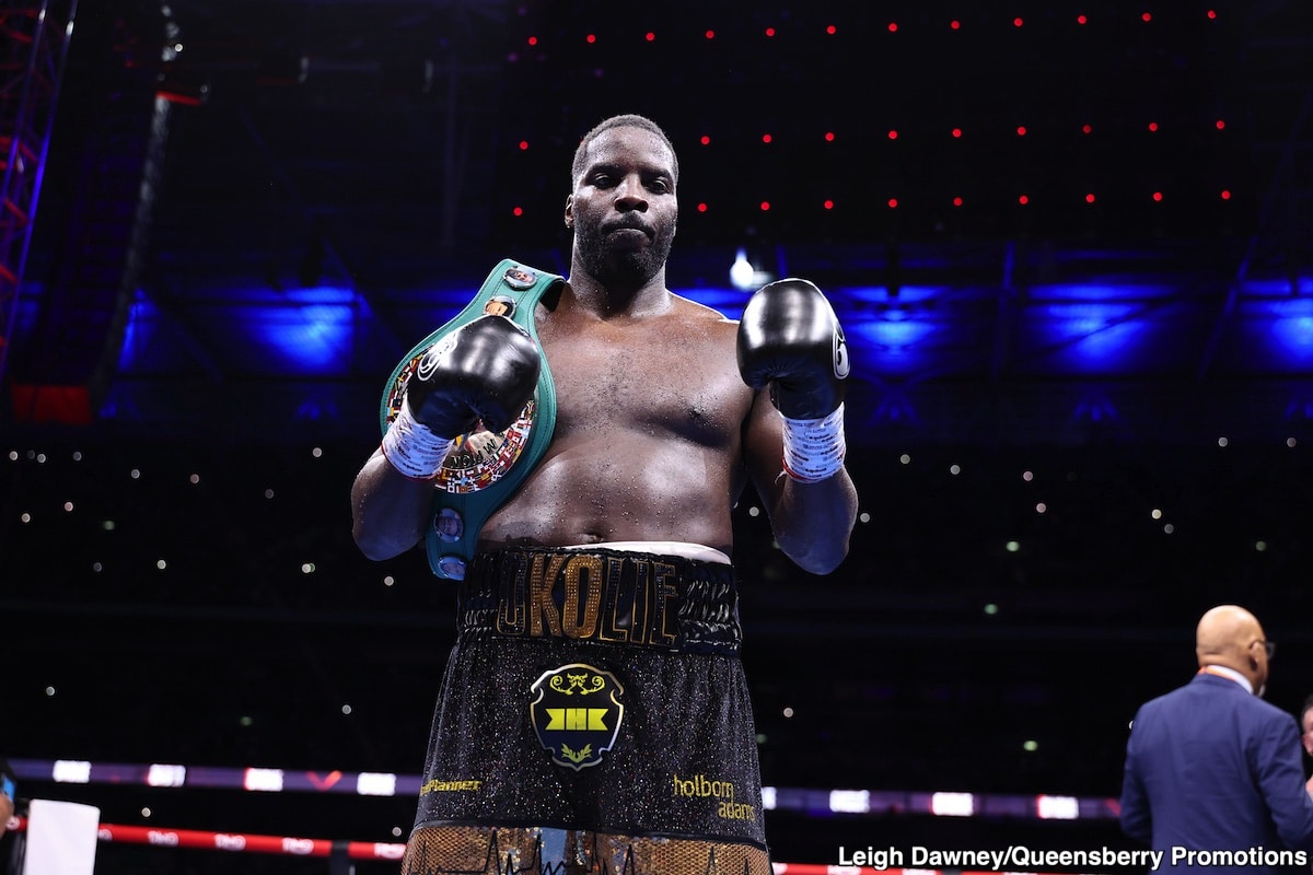 Lawrence Okolie stands in the ring after defeating Kevin Lerena by unanimous decision in London