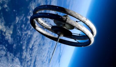 An illustration of a space station made of two large circular stacked rings connected by metal spires in between floating above Earth