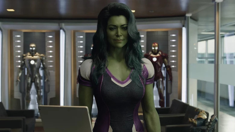 Tatiana Maslany's She-Hulk in an office with Iron Man armors on She-Hulk: Attorney at Law