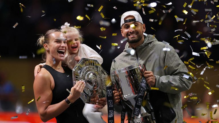 Aryna Sabalenka, her goddaughter Nicole, and Nick Kyrgios celebrate with trophies following the match. Pic: Reuters